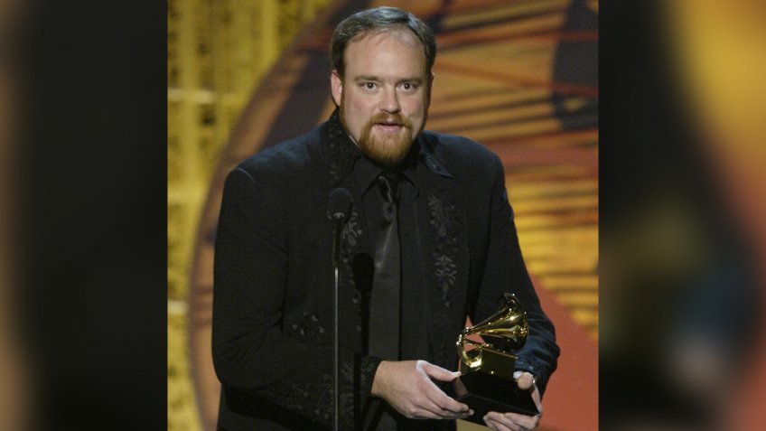 John Carter Cash, son of country legend June Carter Cash, accepts the award for best short form music video for "Hurt," featuring Johnny Cash, during the 46th Annual Grammy Awards, in Los AngelesGRAMMYS CEREMONY, LOS ANGELES, USA.
