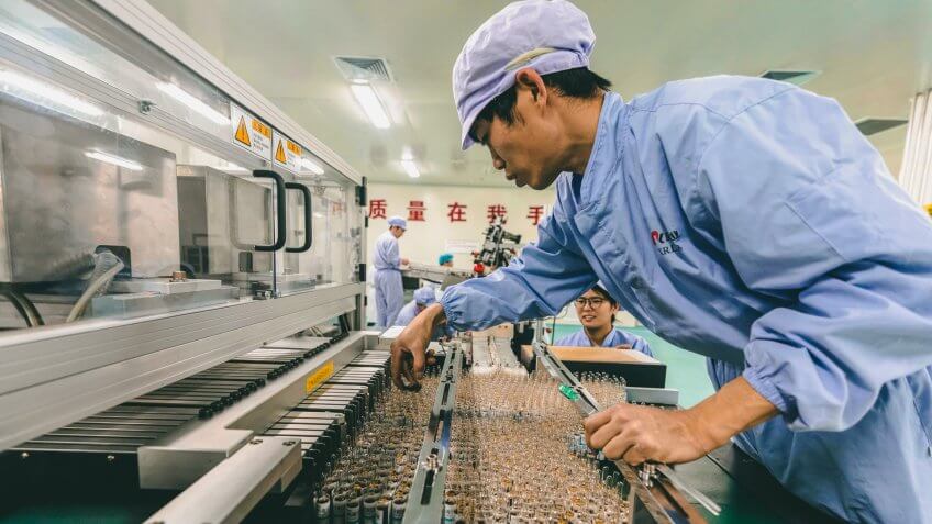 A man works in Kanion Pharmaceutical Chinese traditional medicine production line in Lianyungang, Jiangsu Province, China, 21 May 2019.