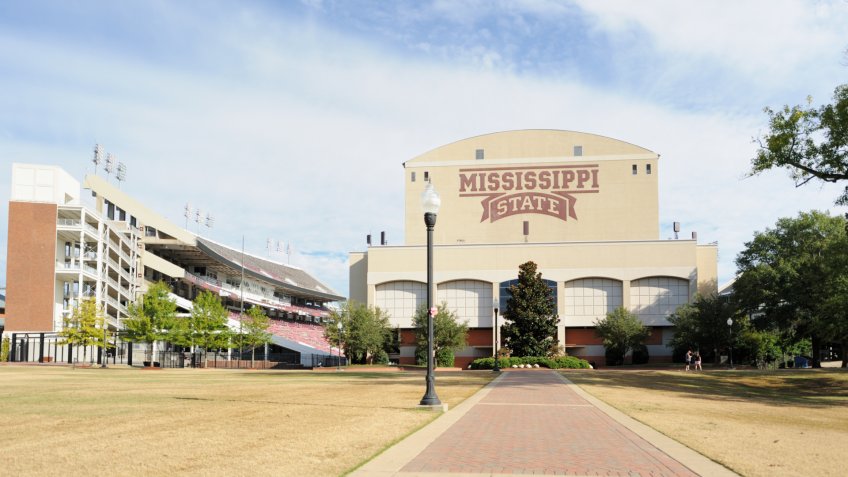 Mississippi State University, Mississippi, USA - October 18, 2014: Looking down sidewalk from the junction towards the sound side of Davis Wade Stadium on the campus of Mississippi State Unviersity, located near the town of Starkville, Mississippi.