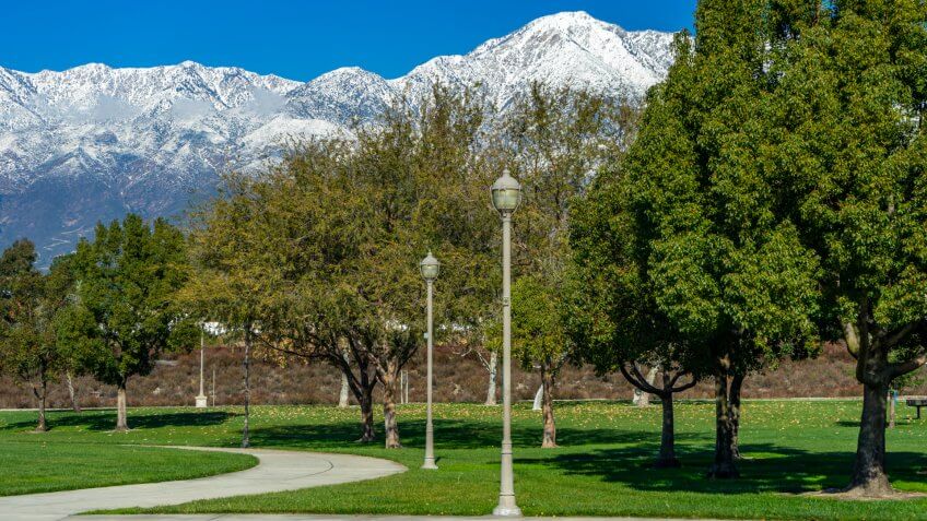 City park in Rancho Cucamonga with a view of snow capped mountains.