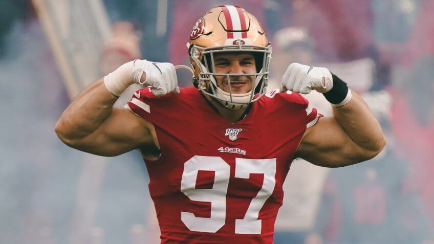 San Francisco 49ers defensive end Nick Bosa (97) is introduced before the NFL NFC Championship football game against the Green Bay Packers, in Santa Clara, CalifNFC Championship Packers 49ers Football, Santa Clara, USA - 19 Jan 2020.