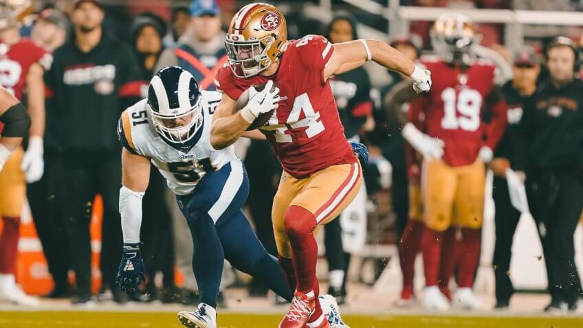 San Francisco 49ers fullback Kyle Juszczyk (44) runs against Los Angeles Rams linebacker Troy Reeder (51) during the first half of an NFL football game in Santa Clara, CalifRams 49ers Football, Santa Clara, USA - 21 Dec 2019.