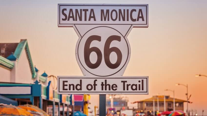 Historic Route 66 sign on pierce of Santa Monica California.