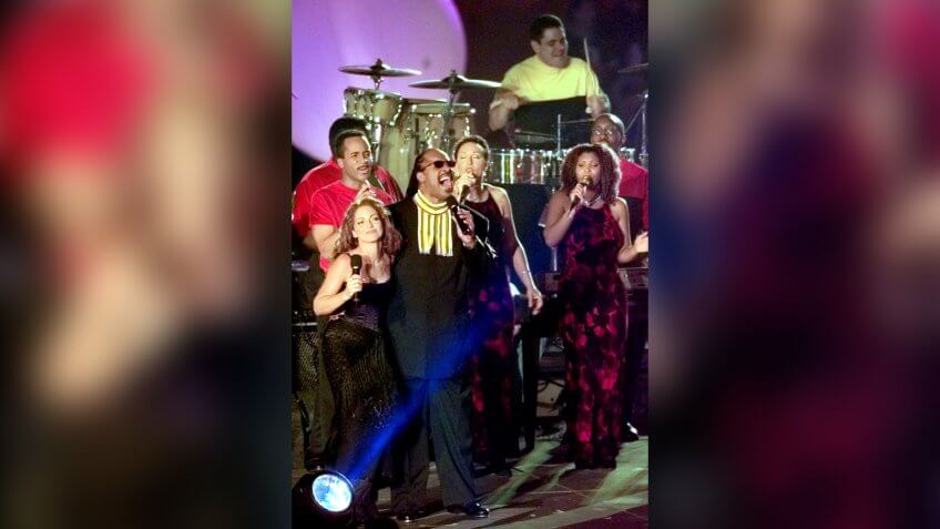 Entertainer Gloria Estefan, left, sings with Stevie Wonder during the halftime show of Super Bowl XXXIII, at Pro Player Stadium in MiamiSUPER BOWL, MIAMI, USA.