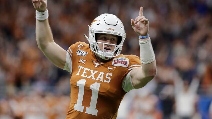 Mandatory Credit: Photo by Austin Gay/AP/Shutterstock (10516720a)Texas quarterback Sam Ehlinger (11) during the first half of the Alamo Bowl NCAA college football game against Utah in San AntonioTexas Football, San Antonio, USA - 31 Dec 2019.