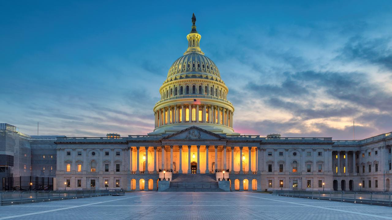 The United States Capitol building at sunset, Washington DC, USA.