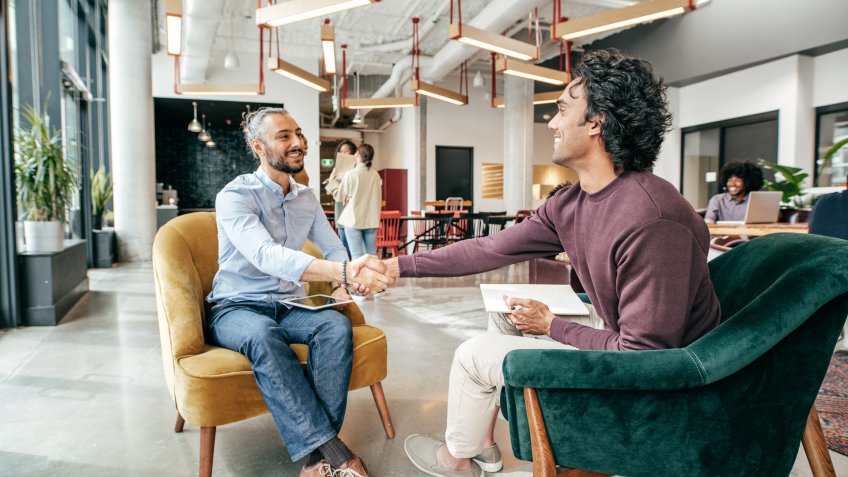 Handshake between recruiter and newcomer.