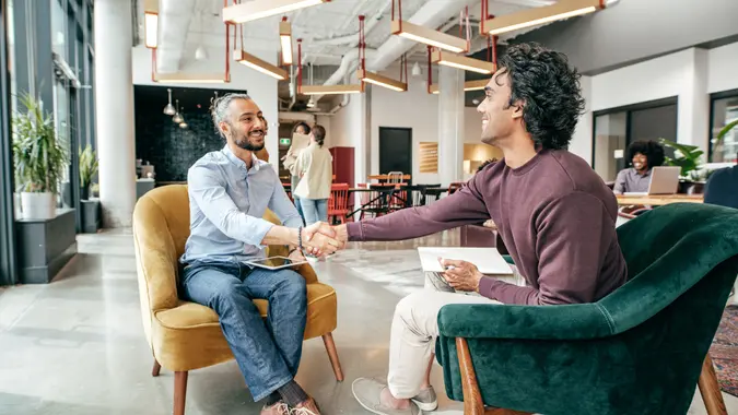 Handshake between recruiter and newcomer.
