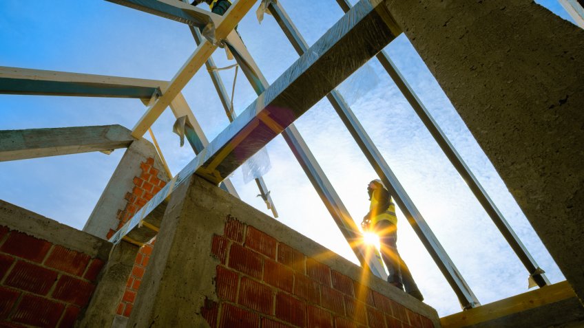 Manual worker working at construction site.
