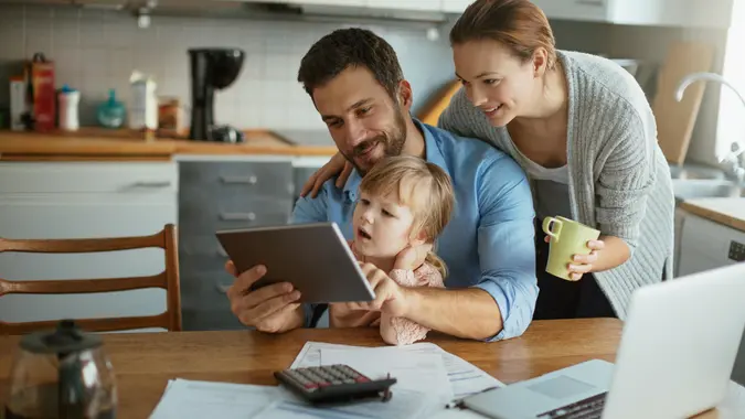 Photo of a young family spending morning together.