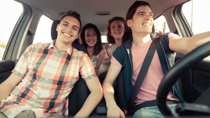 friends carpooling to the game
