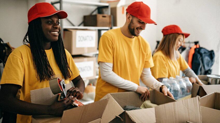 Group of mixed race people working in charitable foundation.