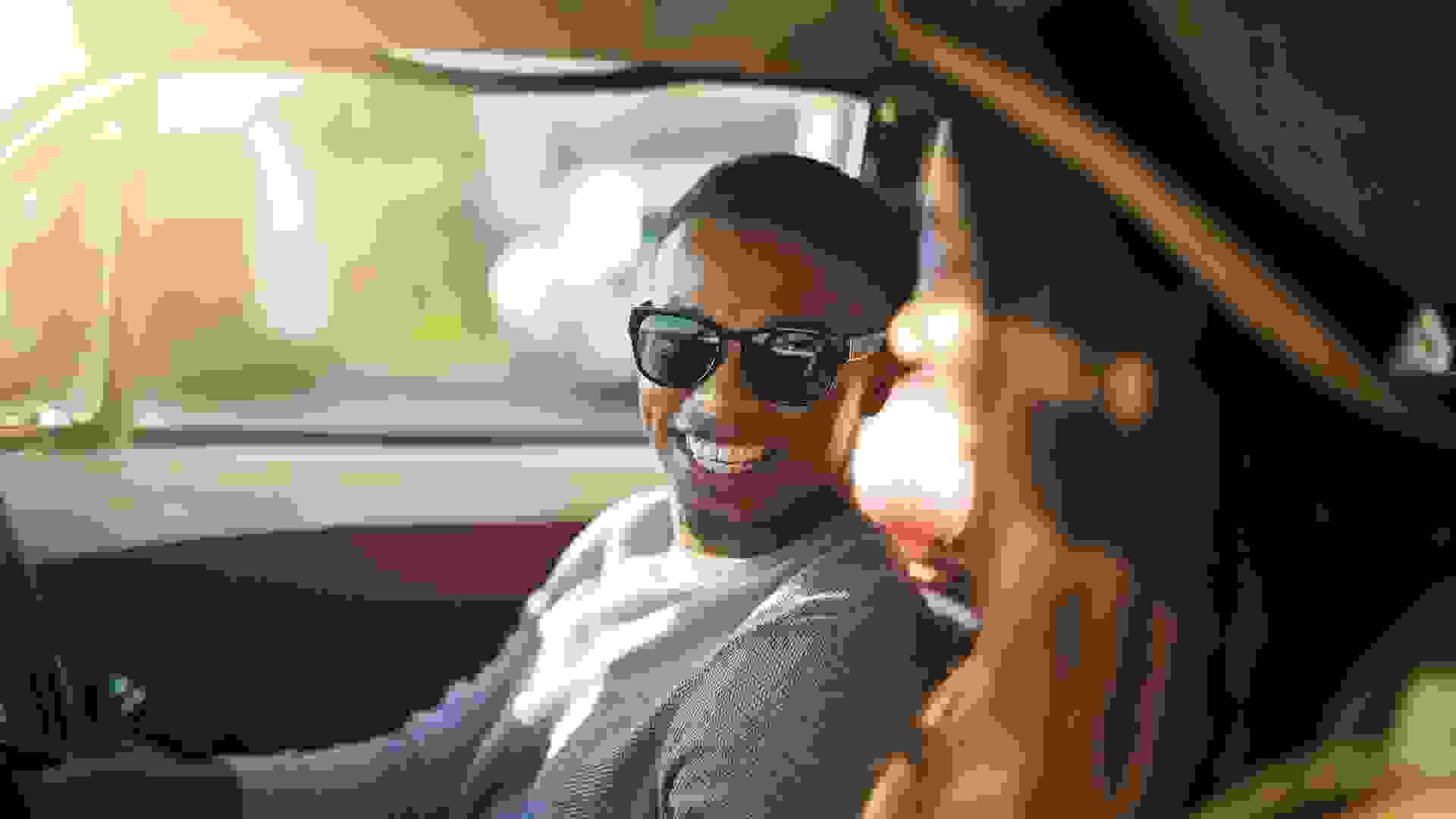 Shot of a handsome young man out on a road trip.