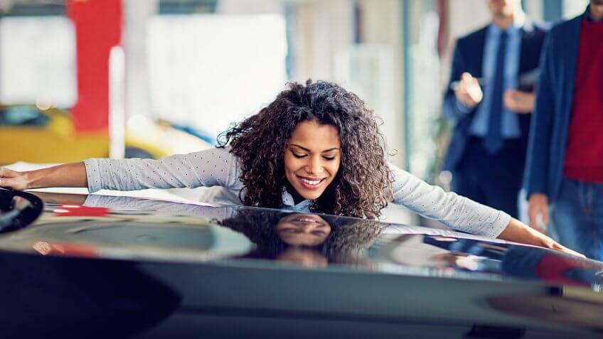 Husband is surprising his wife with a new car.