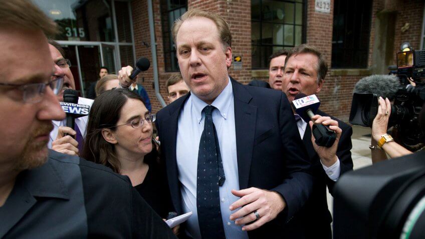 Curt Schilling Former Boston Red Sox pitcher Curt Schilling, center, is followed by members of the media as he departs the Rhode Island Economic Development Corporation headquarters, in Providence, R.