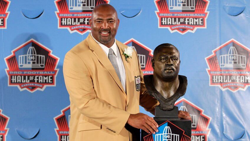 Dermontti Dawson Former NFL player Dermontti Dawson poses with a bust of himself during an induction ceremony at the Pro Football Hall of Fame, Saturday, Aug.