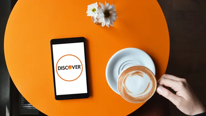 Discover Bank app on coffee table
