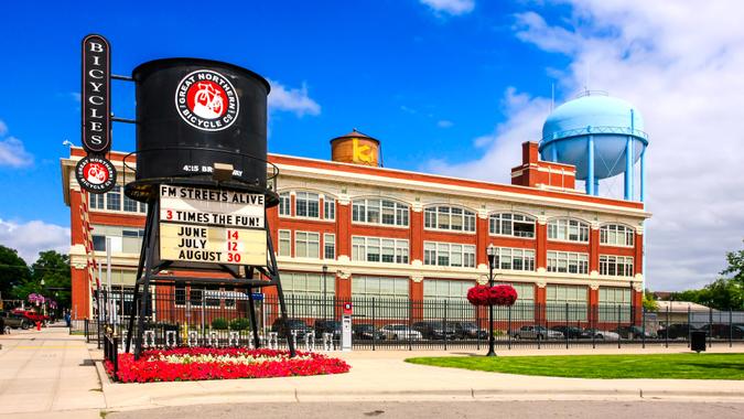 Fargo, ND, USA - July 24, 2015: The old railway water tower advertising the Great Northern Bicycle Co in front the Fargo-Moorhead complex in downtown Fargo N.