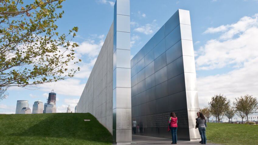 JERSEY CITY - SEPT 18: Pedestrians stand near the 9/11 "Empty Sky" memorial in Liberty State Park on September 18, 2011 in Jersey City, NJ.