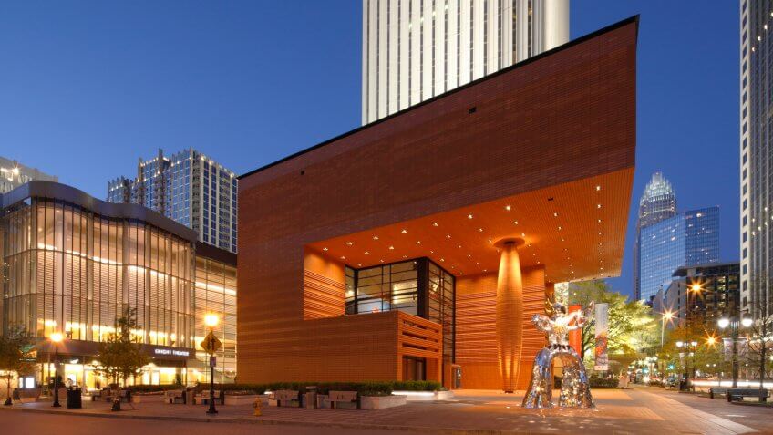 "Charlotte, North Carolina, USA - April 2, 2011: The Bechtler Museum of Modern Art and Firebird statue lights up night in uptown Charlotte.