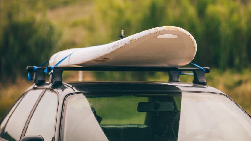 Windsurfing board on the top of the car.