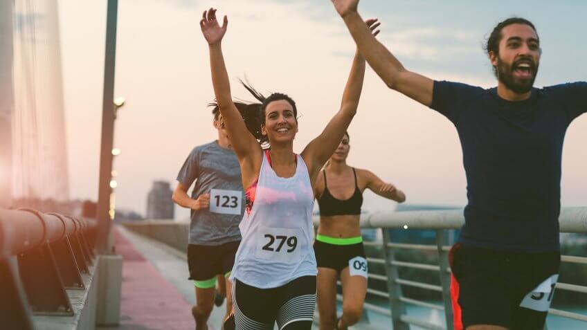 Runners running marathon in the city.