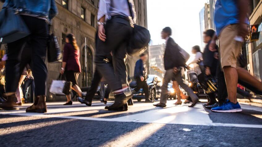 Crosswalk, people crossing in downtown.