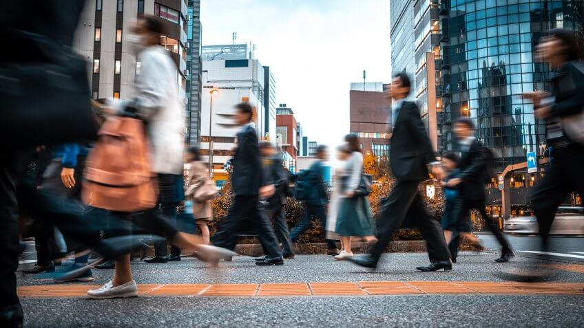 Crowd of business people on their way from work.