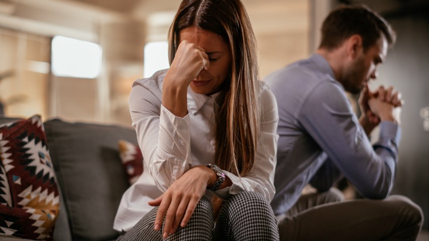 Unhappy young couple.
