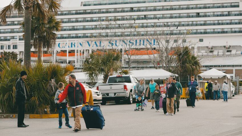 Mandatory Credit: Photo by Mic Smith/AP/Shutterstock (10584695f)Passengers disembark from the Carnival Sunshine cruise ship, in Charleston, S.