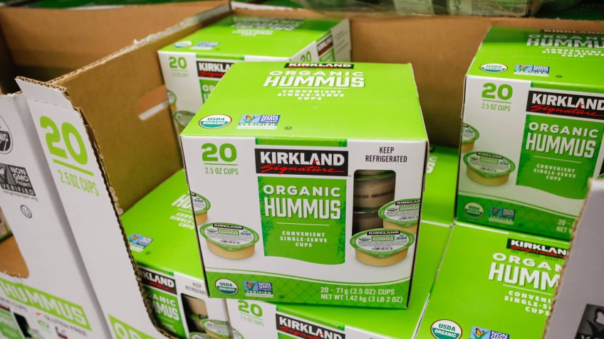 Alhambra, California/United States - 02/19/2020: A view of several cases of Kirkland Signature Organic Hummus, on display at a local Costco.