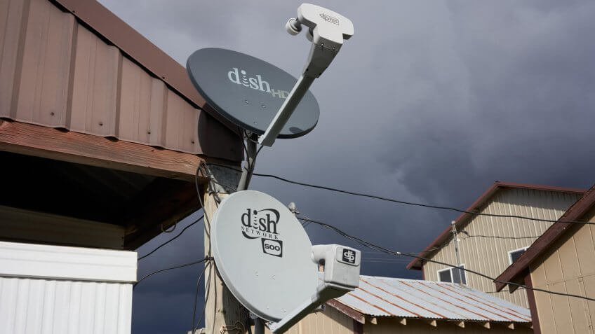 Parkdale, Oregon, USA - Oct 26, 2019: DISH satellite TV antennas are seen in a farm.