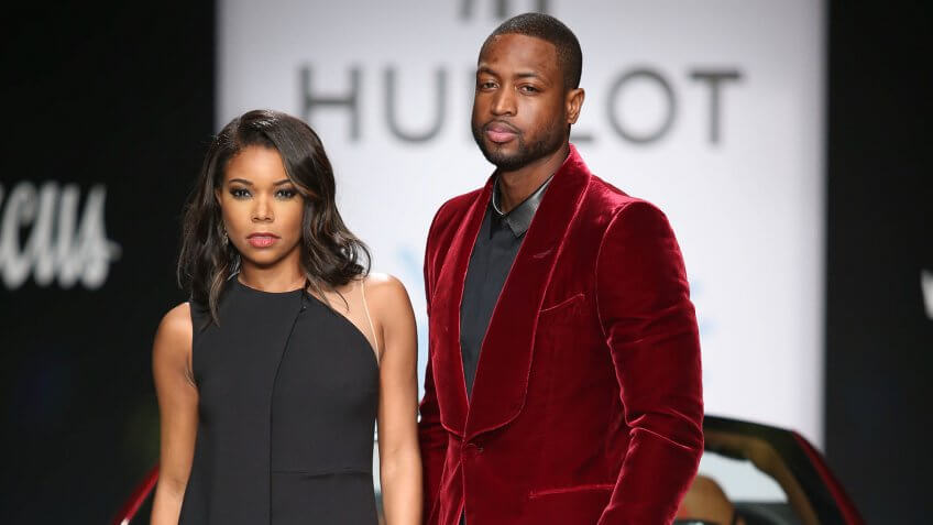 Mandatory Credit: Photo by Omar Vega/Invision/AP/Shutterstock (9135196e)Gabrielle Union and Dwyane Wade pose on the runway during the 3rd Annual "A Night on the RunWade" benefiting Wade's World Foundation at Ice Palace Studios on in Miami, FL3rd Annual "A Night on the RunWade", Miami, USA.