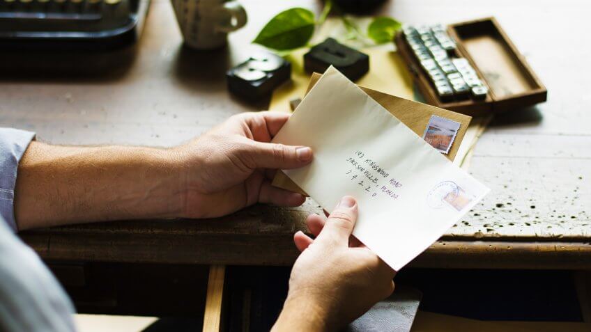 People Hands Holding Envelope Letter Communication.