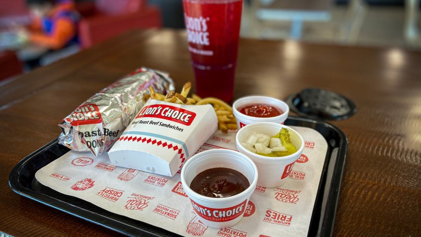 O’Fallon, Illinois—Nov 16, 2019; Italian Roast Beef sandwich meal sitting on tray with condiments; Lions Choice is a Saint Louis, Missouri regional fast food restaurant chain established in 1967.