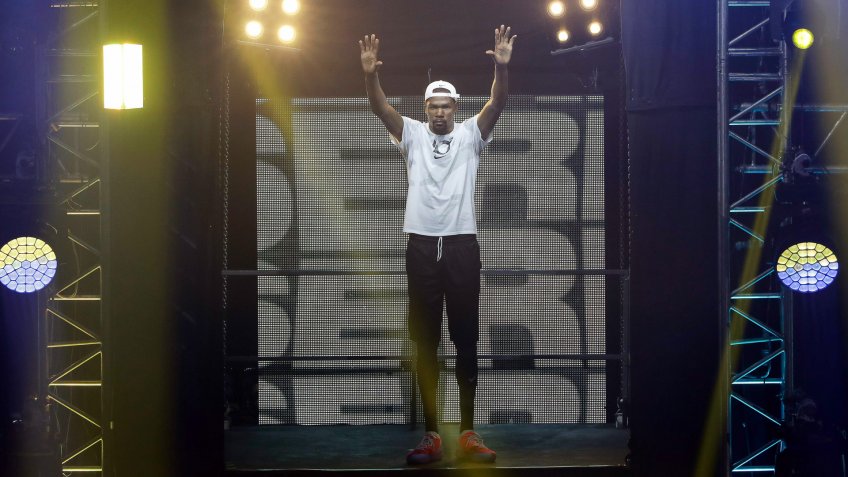 Mandatory Credit: Photo by Mark R Cristino/EPA-EFE/Shutterstock (9745177o)Kevin DurantKevin Durant in Manila, Philippines - 08 Jul 2018Golden State Warriors forward Kevin Durant greets fans as he arrives for a basketball exhibition game in Quezon City, east of Manila, Philippines, 08 July 2018.