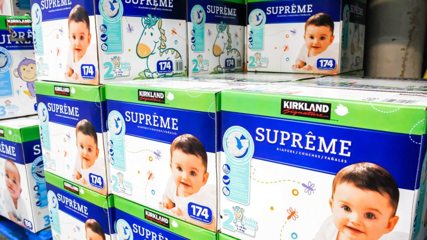 Tustin, California/United States - 02/08/2020: A view of several cases of Kirkland Signature Supreme diapers on display at a local Costco.