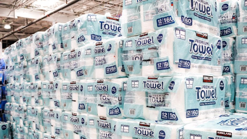 Tustin, California/United States - 02/08/2020: A view of several cases of Kirkland Signature Premium Towel paper towels on display at a local Costco.