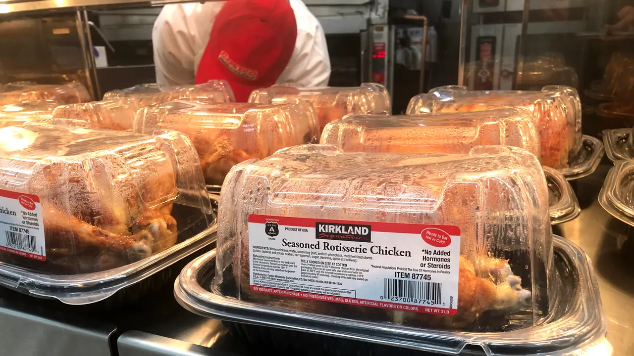 Los Angeles, CA/USA 11/25/2019 Kirkland brand seasoned rotisserie chickens for sale at a Costco Mega Discount Store.