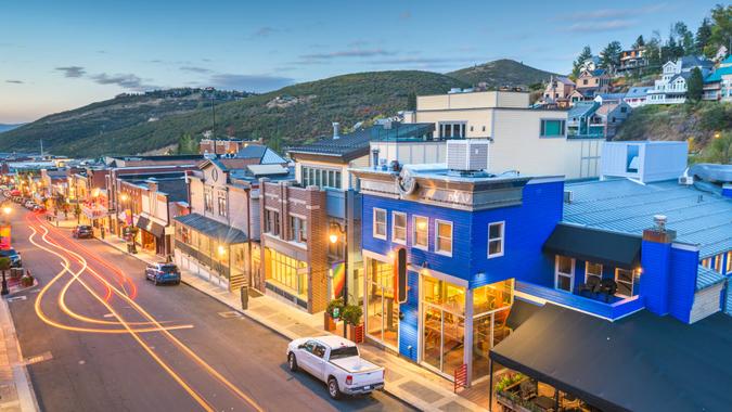 Park City, Utah, USA town skyline over Main Street at twilight.