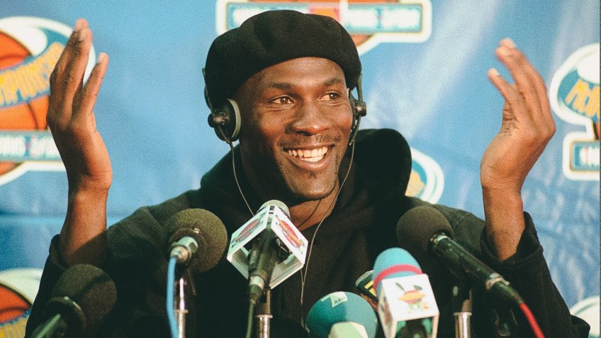 JORDAN FILES -Chicago Bulls player Michael Jordan gestures during a news conference at Bercy stadium in Paris .