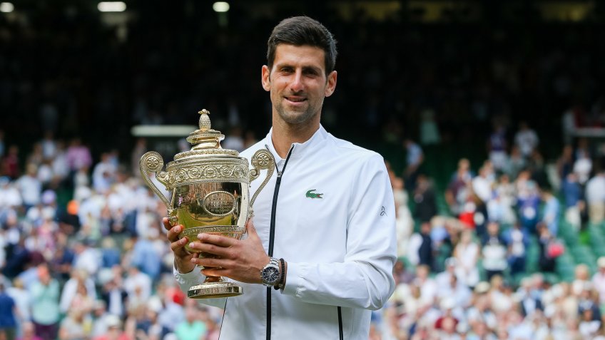Mandatory Credit: Photo by Aflo/Shutterstock (10334442d)Novak Djokovic of Serbia poses with the trophy after winning the men's singles final match against Roger Federer of SwitzerlandWimbledon Tennis Championships, London, UK - 14 Jul 2019.