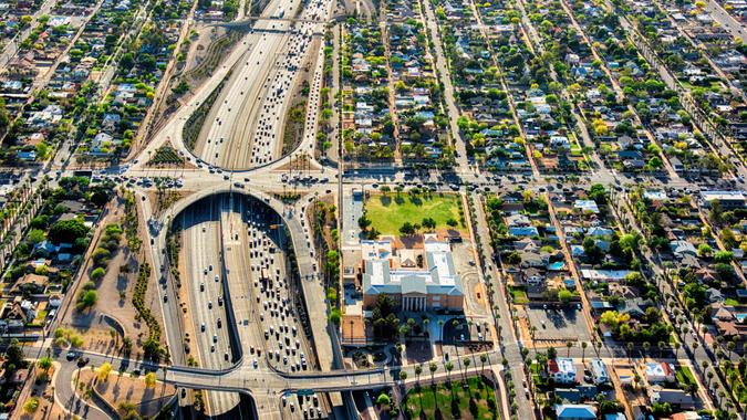 An aerial view of a Phoenix, Arizona freeway during rush hour shot from an altitude of about 1500 feet during a helicopter photo flight using a wide angle lens.