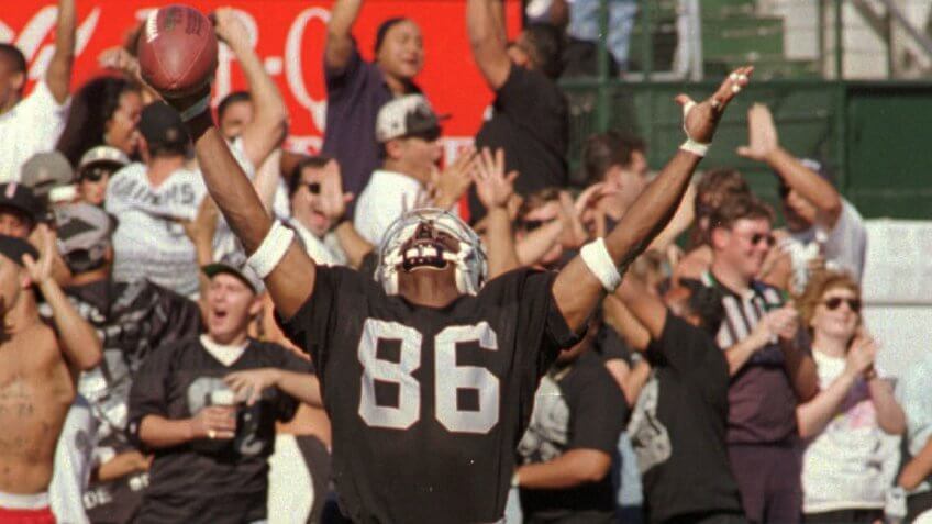 Mandatory Credit: Photo by Paul Sakuma/AP/Shutterstock (6511433c)ISMAIL Oakland Raiders Raghib "Rocket" Ismail raises his arms in the end zone after catching a 44-yard pass for a touchdown in the fourth quarter against the Indianapolis Colts, at the Coliseum in Oakland, Calif.