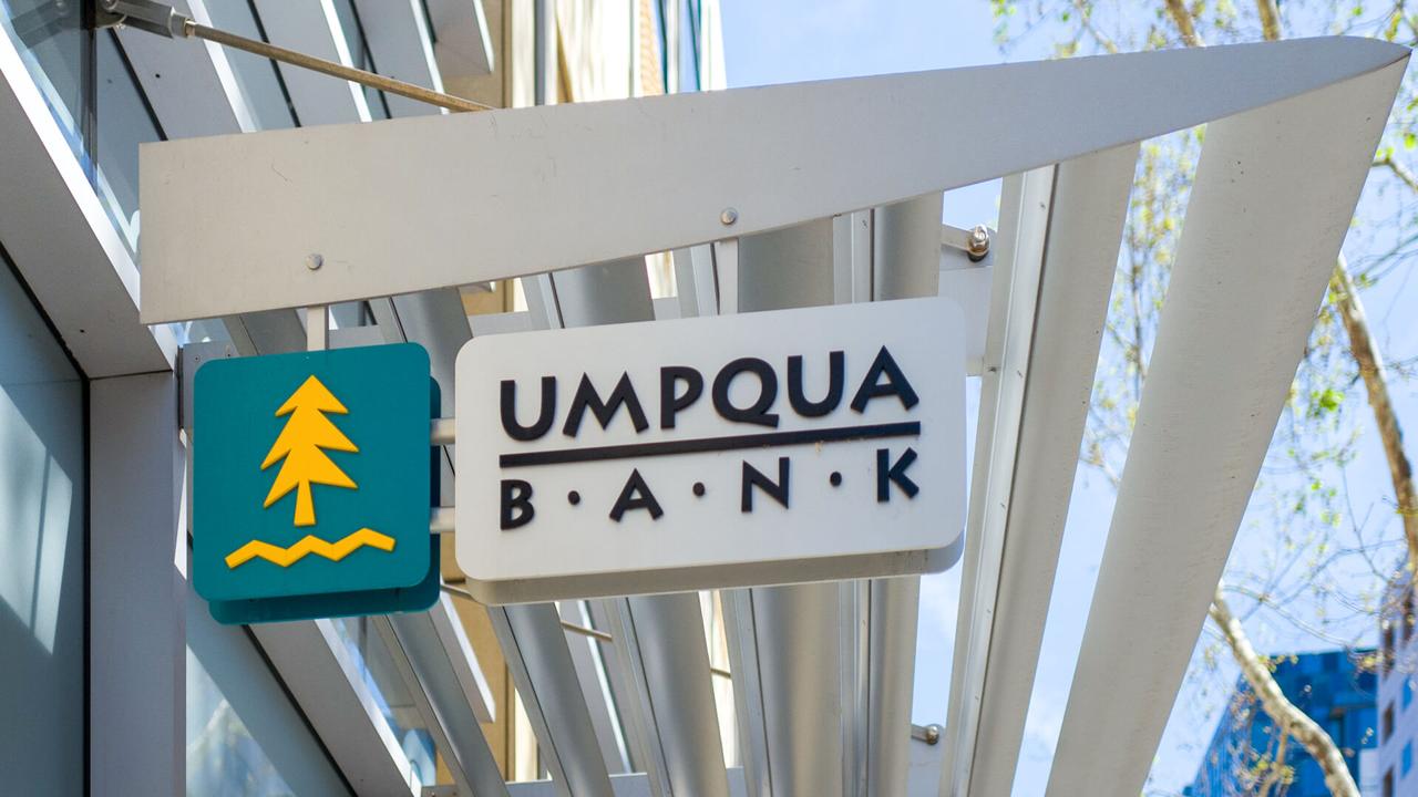 San Jose, California, United States - April 13, 2019:  Close-up of sign with logo for Umpqua Bank in the Silicon Valley town of San Jose, California, April 13, 2019.