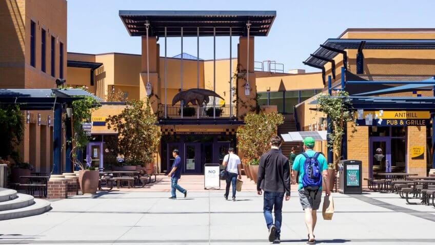 Irvine, California/United States - 08/09/2019: Students walk towards the Student Center on the UCI Campus.