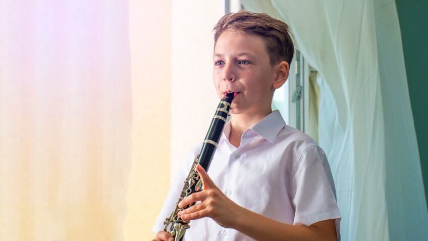 boy playing clarinet