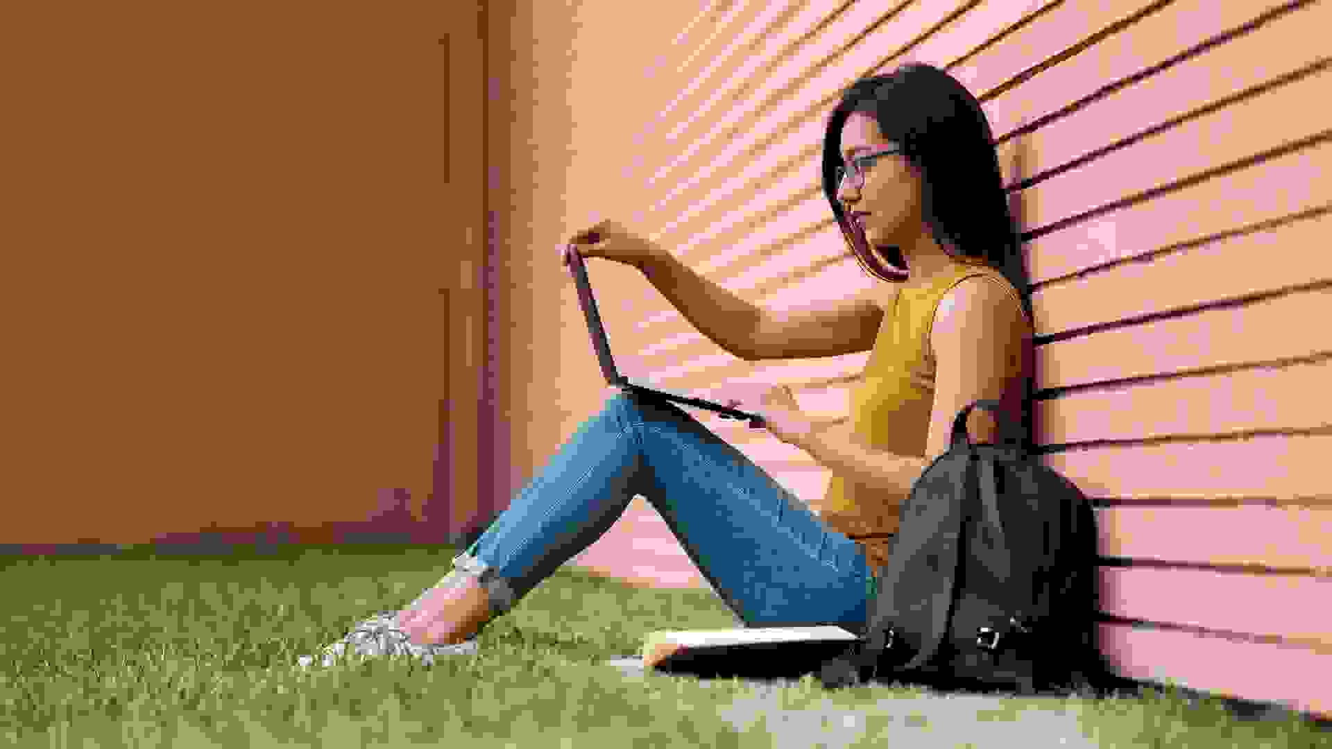 Sideview, Laptop, Sitting, Young Woman, Student, Campus, Outdoors,.