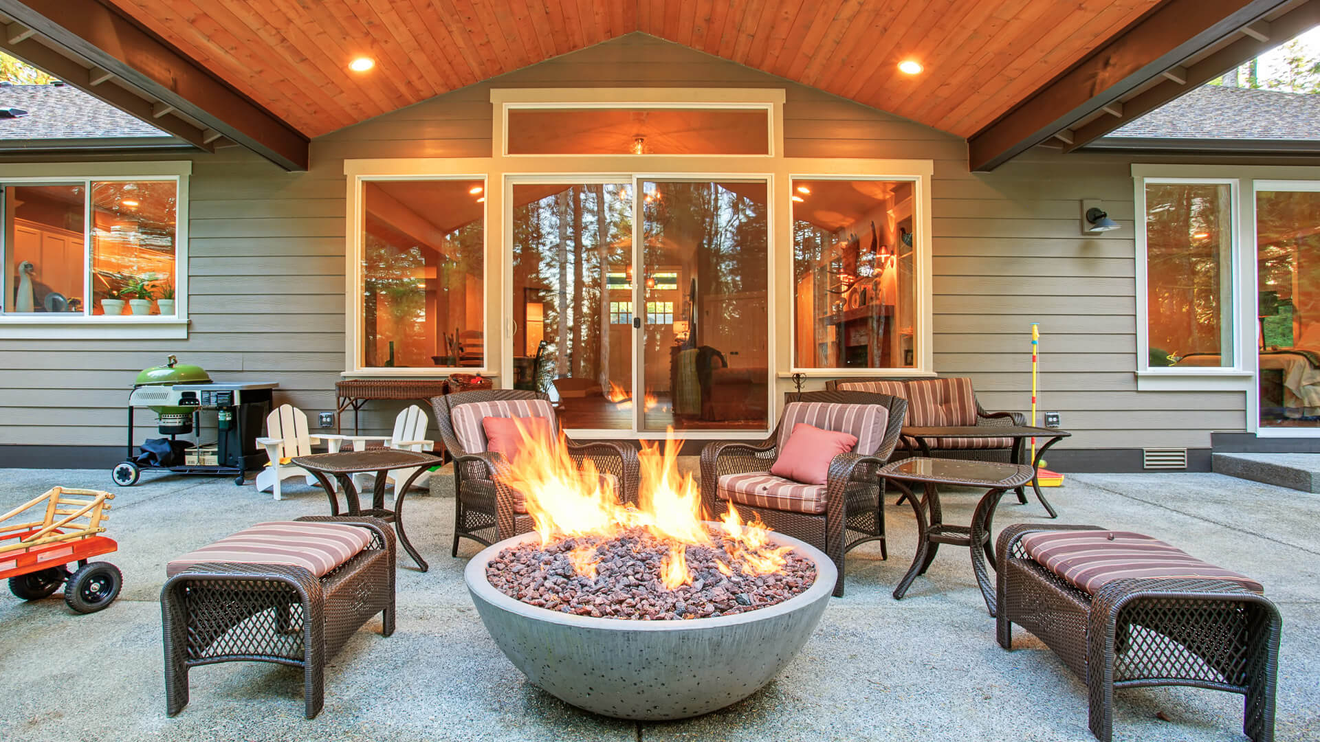 https://cdn.gobankingrates.com/wp-content/uploads/2020/03/fire-pit-house-iStock-479134408.jpg