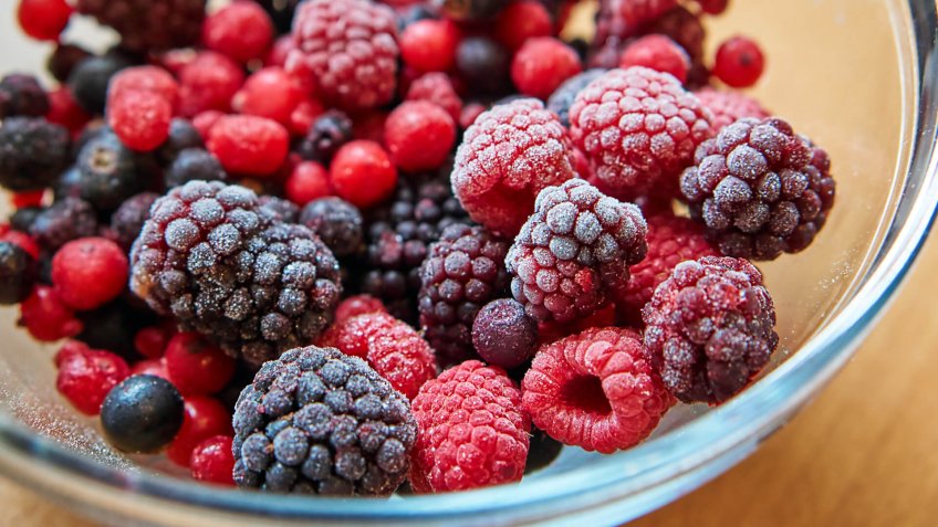 frozen wild berries in a bowl.